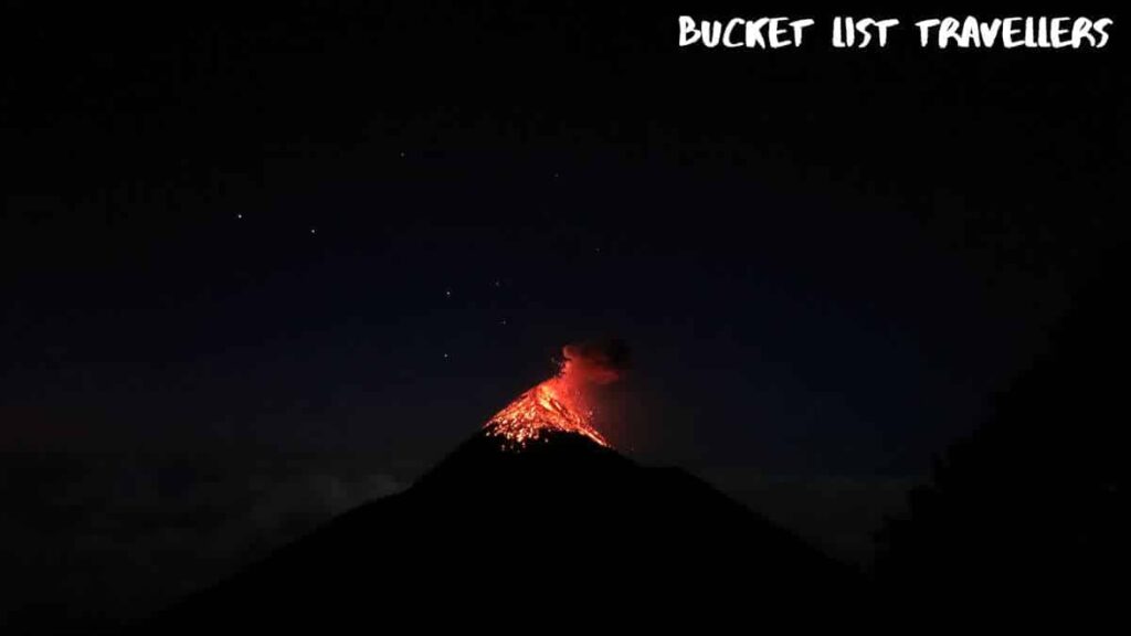 Lava Flowing from Fuego Volcano Guatemala, Volcano at night, stars in sky, Volcano eruption in Guatemala
