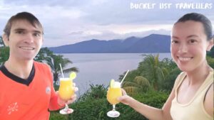 Couple Holding Cocktails at Apoyo Lagoon Nicaragua