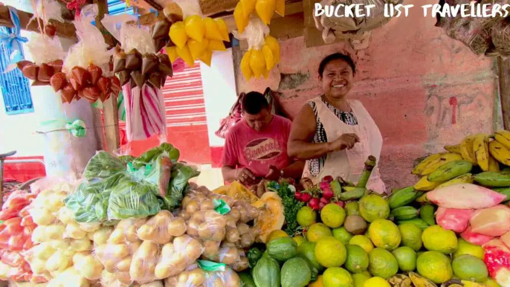 Smiling woman market stall vendor at Mercado Municipal Granada Nicaragua