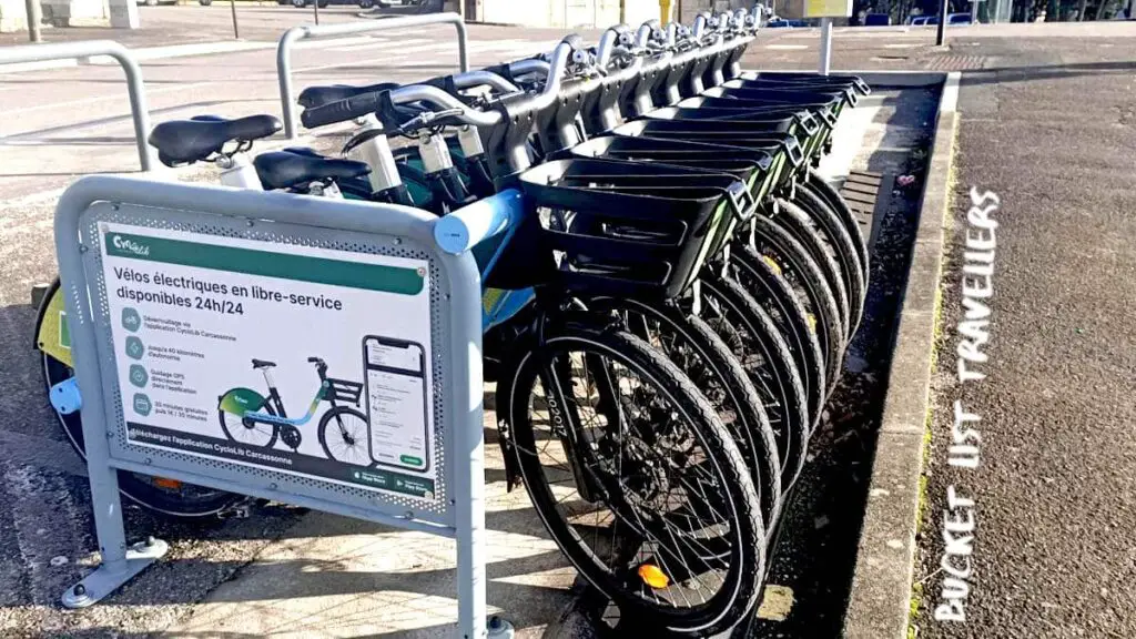 Bike Share outside train station at Carcassonne France, row of bicyces at docking station