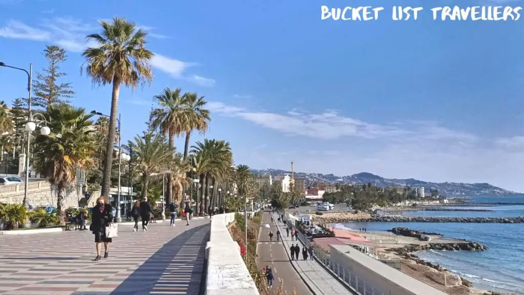 Woman walking along Corso dell'Imperatrice Sanremo Italy