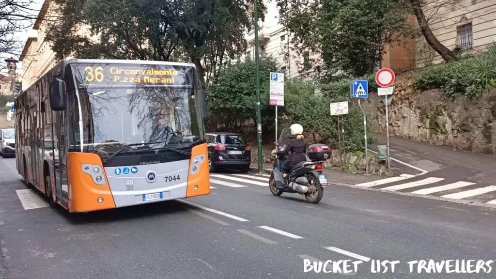 Genoa Bus Italy - Bus number 36, Circonvalmonte Piazza Merani, woman on moped