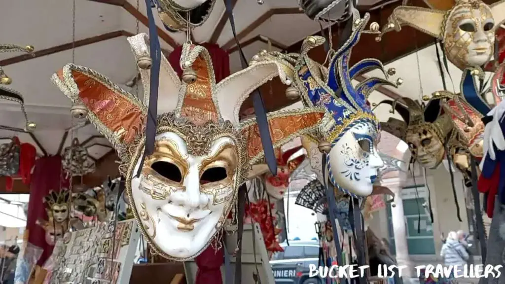 Masks at Market in Piazza delle Erbe Verona Italy