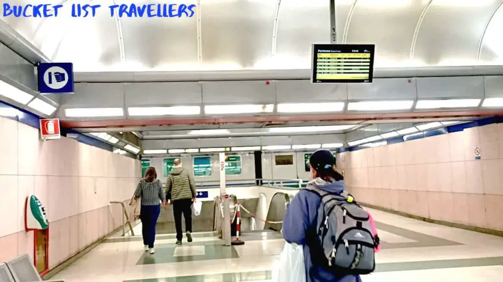 Inside Sanremo Train Station Italy, people walking towards train station stairs