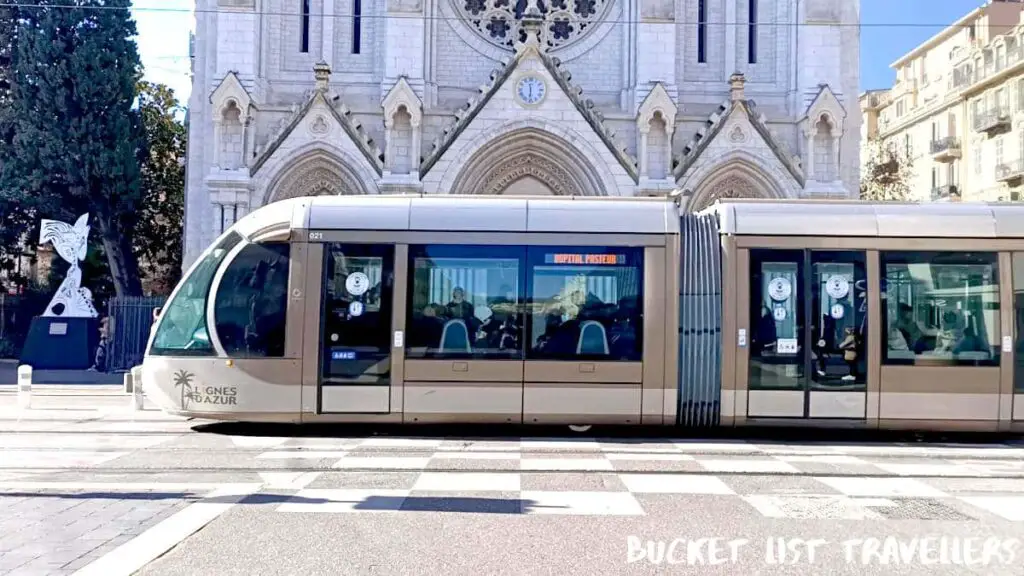 Tram outside Notre-Dame de l’Assomption Basilica Nice France