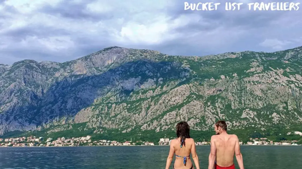 Couple Overlooking Bay of Kotor Montenegro