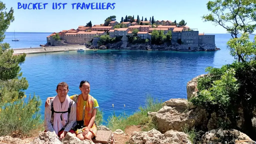 Couple in front of Sveti Stefan Montenegro