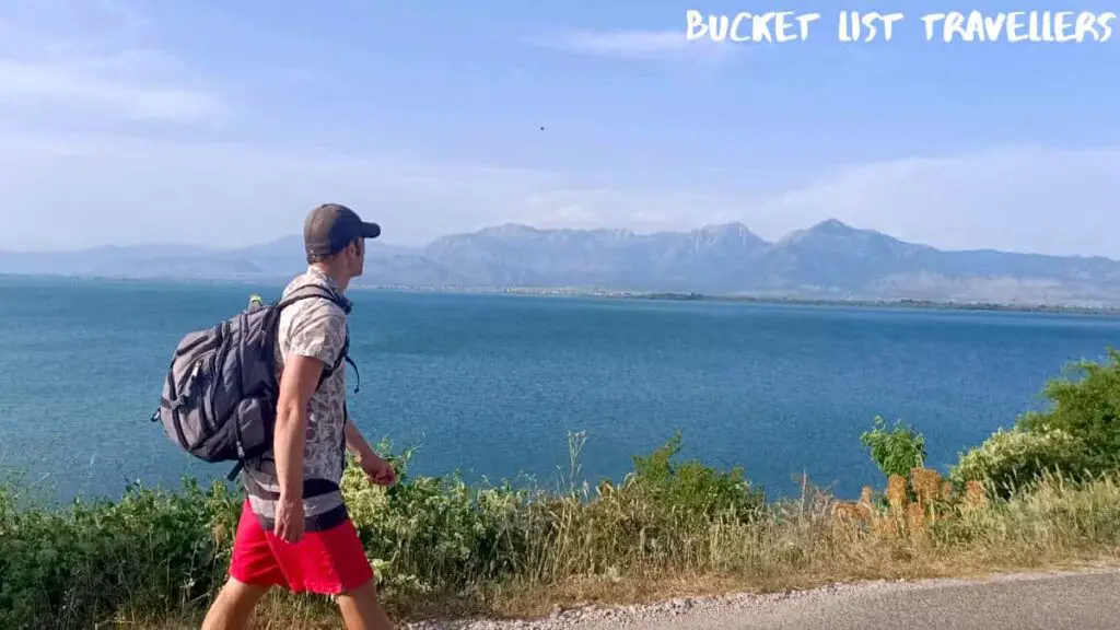 Man Walking Along Lake Skadar Albania (also called Lake Scutari, Lake Shkodër and Lake Shkodra)