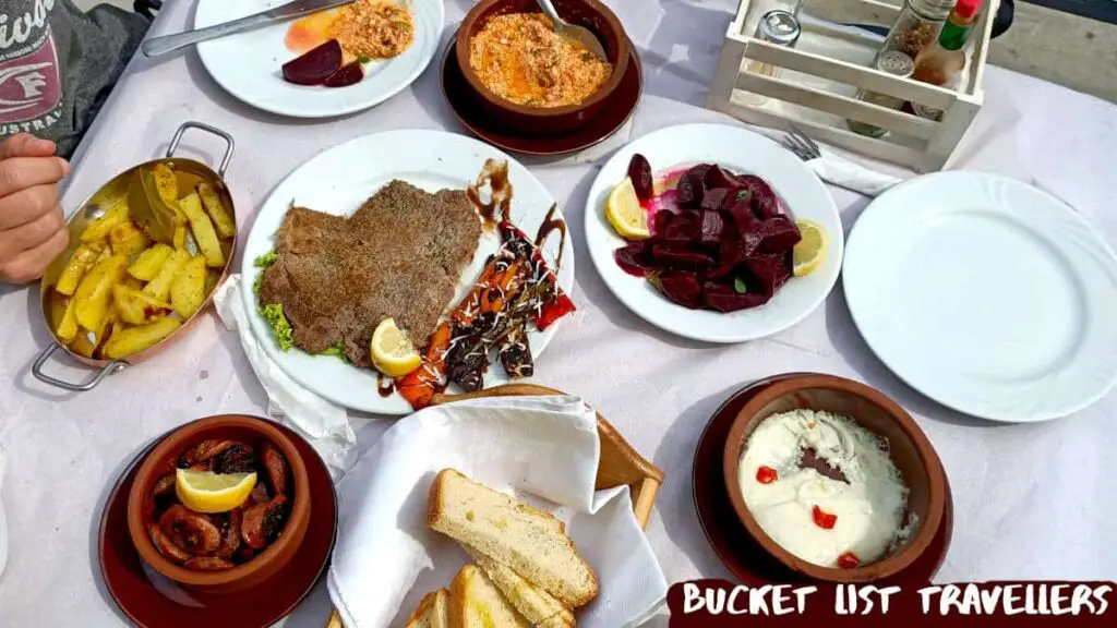 Table full of traditional Albanian food from Vila Bajrami 45 Restaurant Saranda Albania
