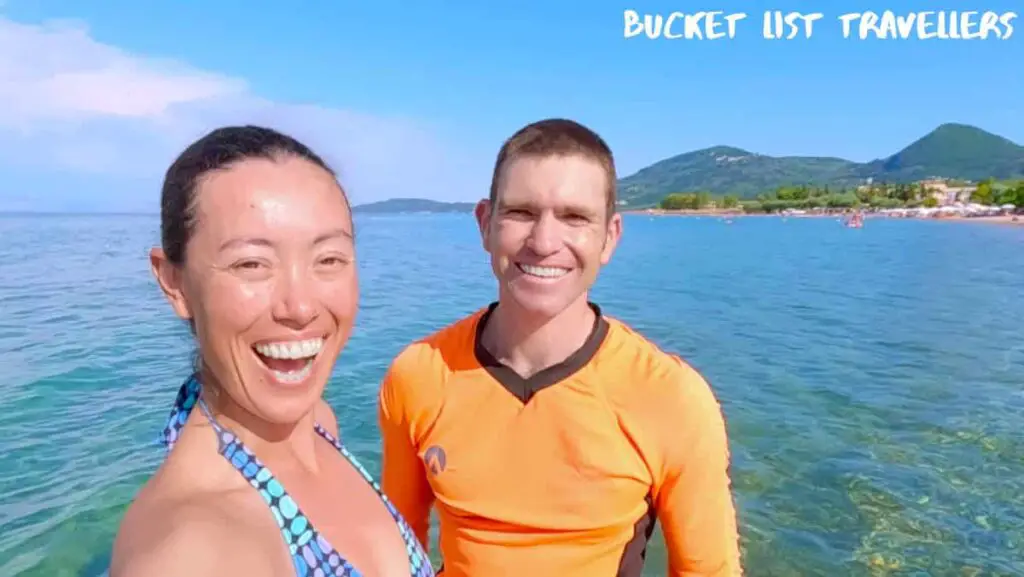 Smiling couple in water at Moraitika Beach Corfu Beach
