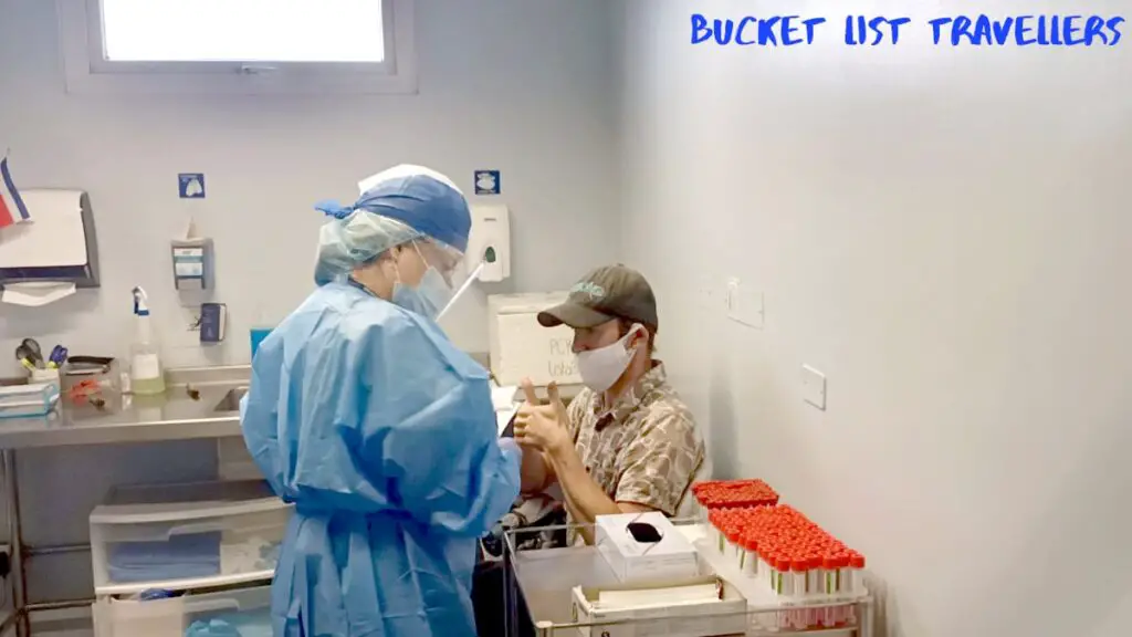 Man getting Covid Antigen Test at Hospital Clínica Bíblica San Jose Costa Rica