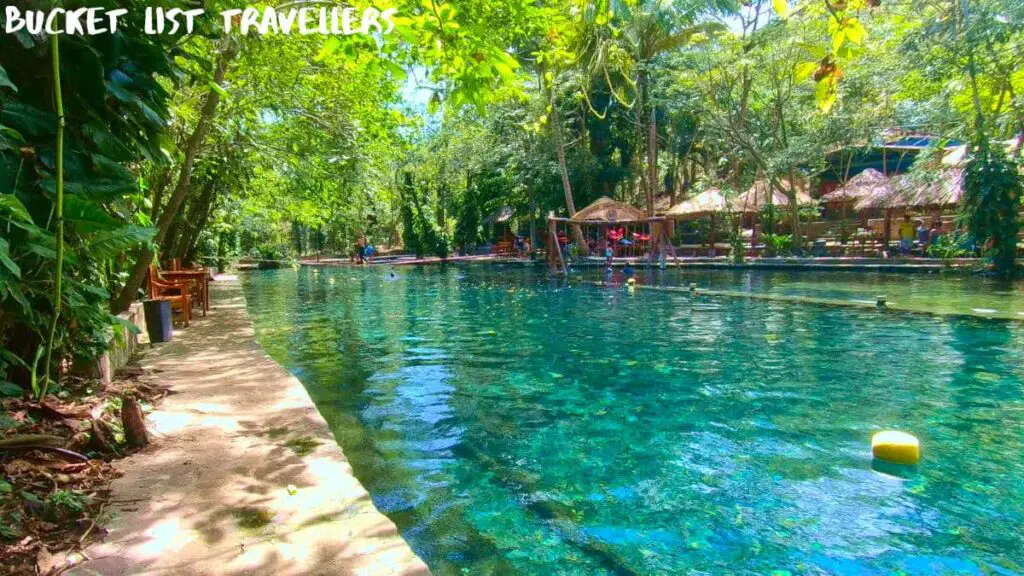 Turquoise water and cabanas at Ojo de Agua Ometepe Island Nicaragua