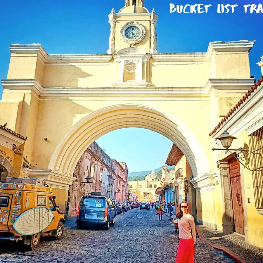 Woman Standing In Front Of Santa Catalina Arch Antigua Guatemala